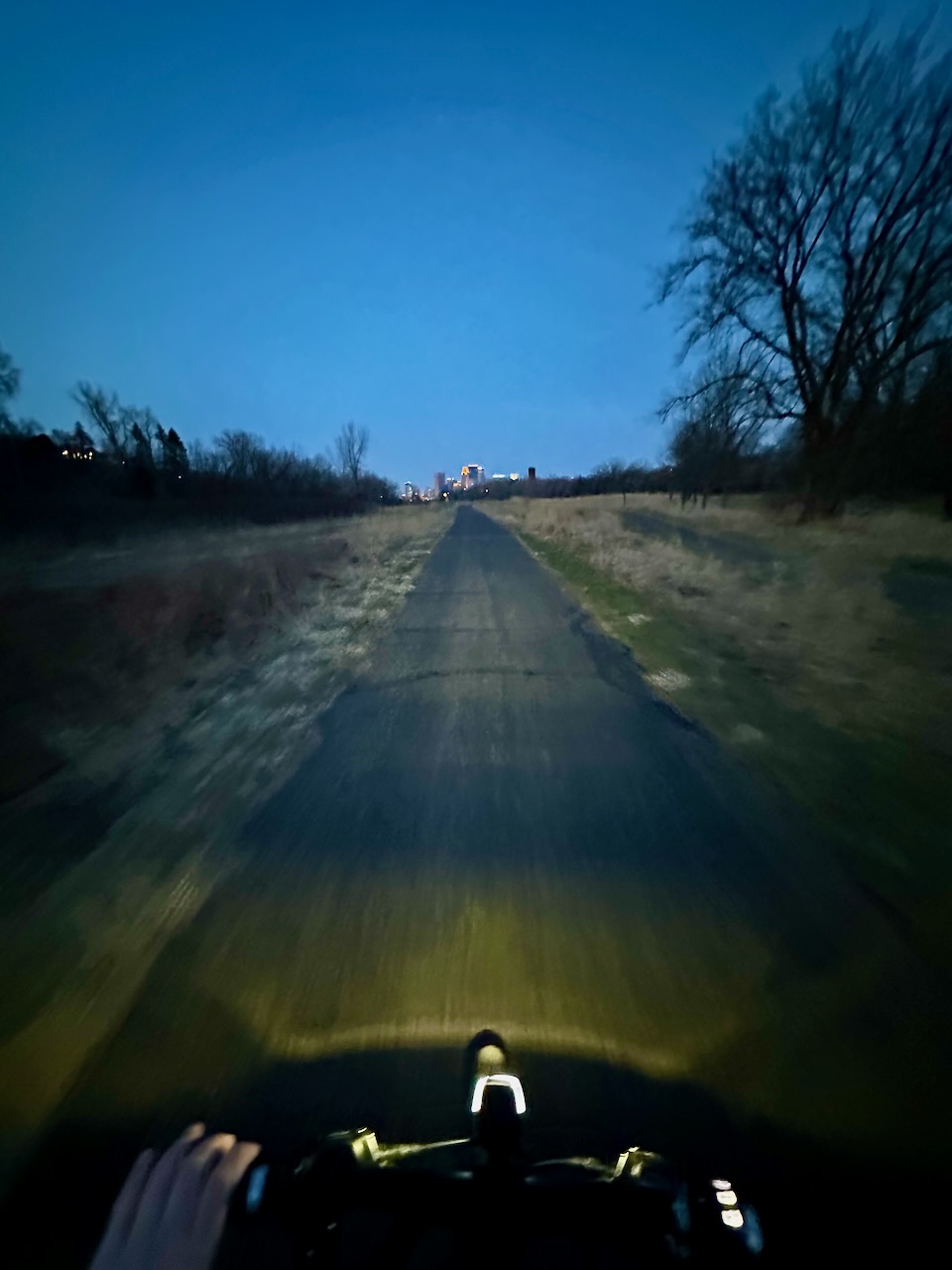 Biking down the Cedar Lake Trail at dusk. Biking down the Cedar Lake Trail at dusk.