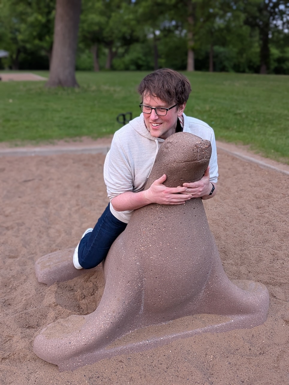Me, attempting to restrain a seal lion statue at Minnehaha Falls. Me, attempting to restrain a seal lion statue at Minnehaha Falls.